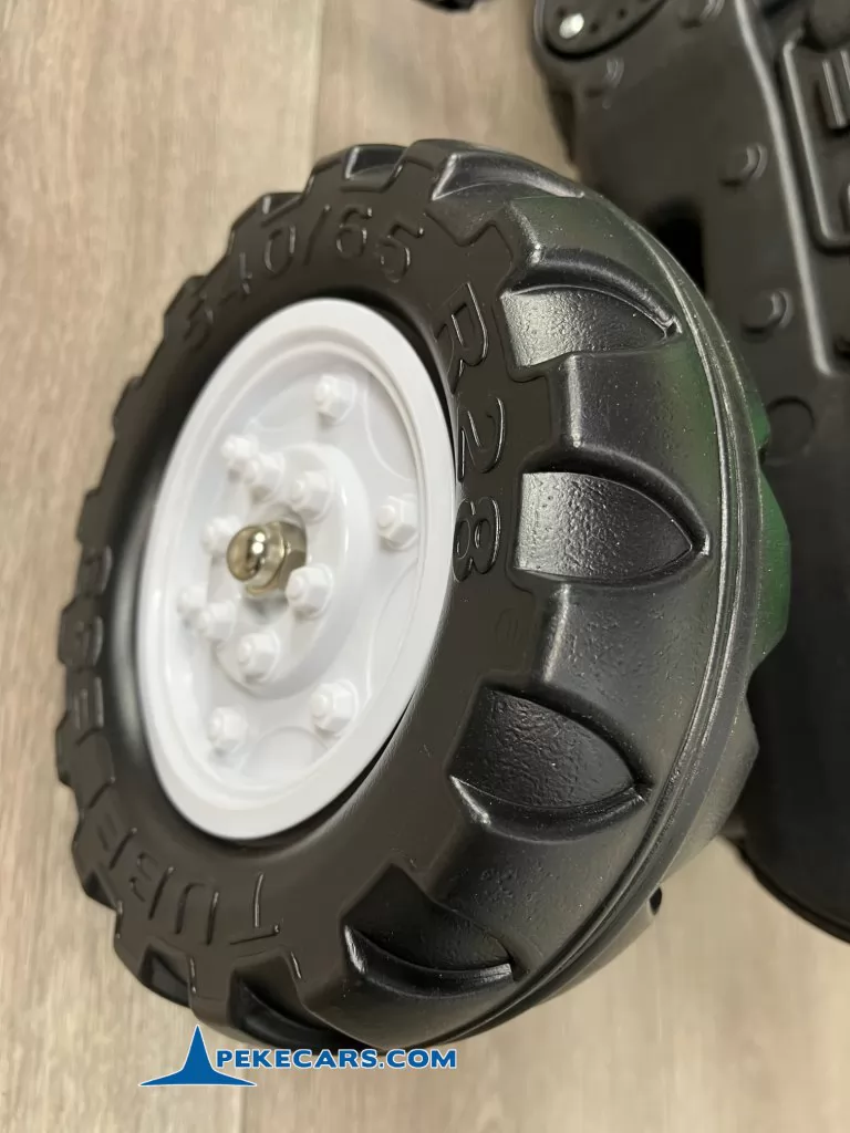 Tractor a pedales para niños verde con remolque y retroexcavadora rueda