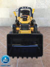 Tractor electrico con pala delantera amarillo vista frontal