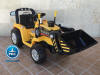 Tractor electrico con pala delantera amarillo vision general