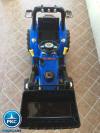 Tractor electrico azul con pala delantera 12V 2.4G new holland Style pekecars