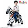 Ponycycle cebra marty pequeño con niño